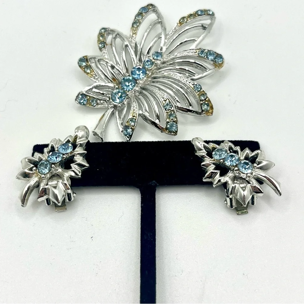 Vintage blue rhinestone butterfly brooch with matching clip earrings silver tone